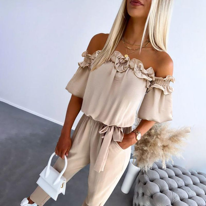 Esther | Elegante Off-Shoulder Jumpsuit met Striktaille