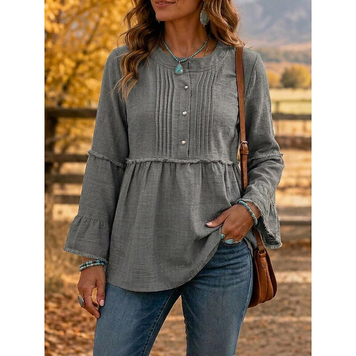 Aaltje | Verfijnde Peplum Blouse met Lange Mouwen
