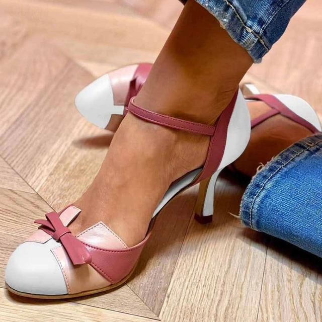 Paulien | Elegante pumps met strikdetail en open hiel